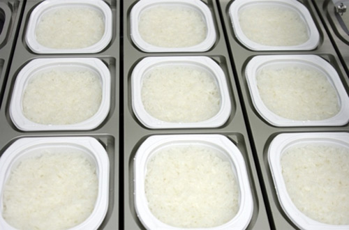 we cook the rice right inside the trays